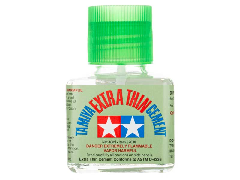 Tamiya's excellent Extra Thin Liquid cement for plastic models